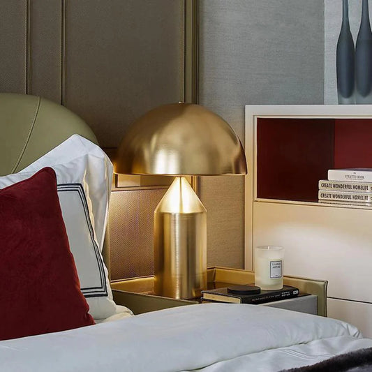 Marin geometric table lamp with clean modern silhouette on a solid metal body
