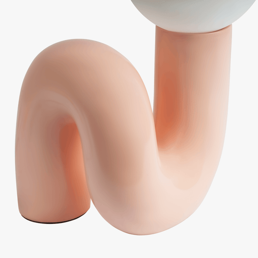 Aurelo Pink sculptural lamp base detail with curved metal stem