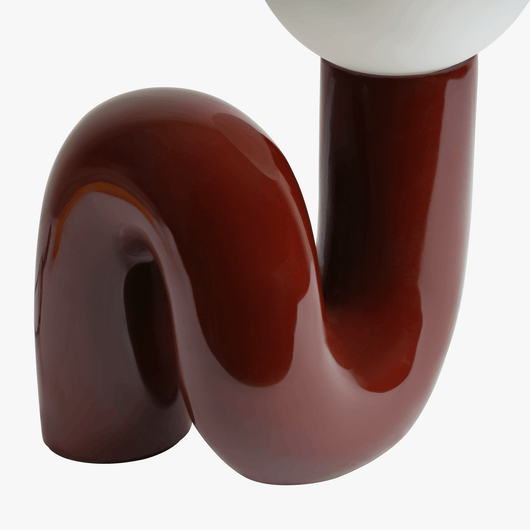 Aurelo Dark Cherry sculptural lamp base detail with curved metal stem