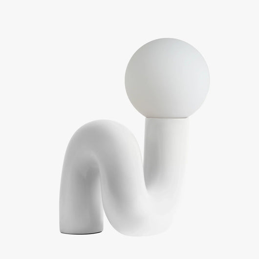 Aurelo sculptural table lamp in White with frosted glass globe on hand-curved metal base