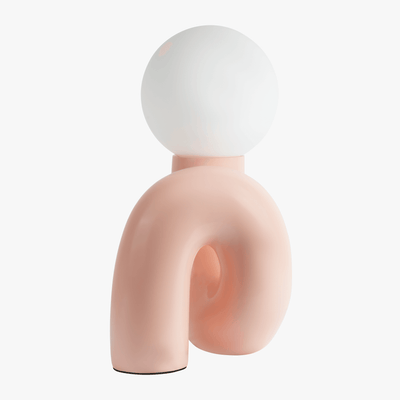 Aurelo Pink sculptural lamp side view showing the hand-curved metal base