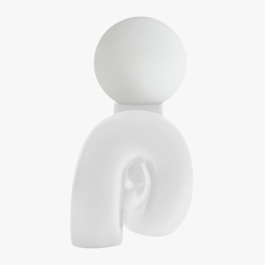 Aurelo White sculptural lamp side view showing the hand-curved metal base