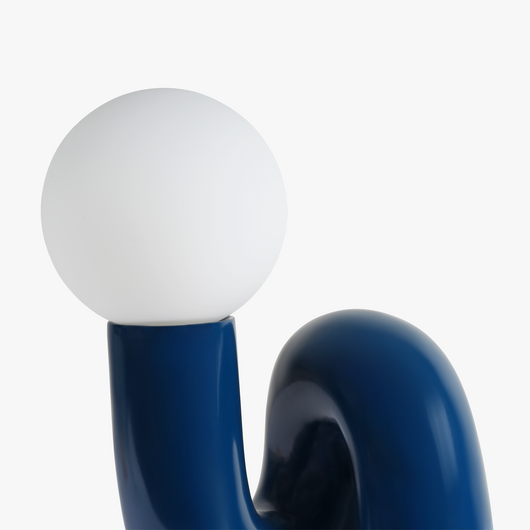 Aurelo Midnight Blue sculptural lamp viewed from above showing the frosted glass globe