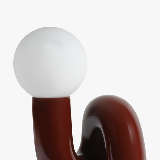 Aurelo Dark Cherry sculptural lamp viewed from above showing the frosted glass globe