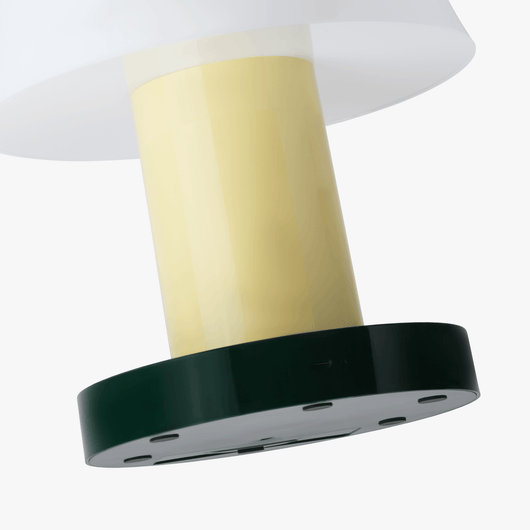 Linn cordless table lamp with compact silhouette, rechargeable battery base, and warm light tone