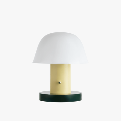 Linn cordless table lamp with compact silhouette, rechargeable battery base, and warm light tone