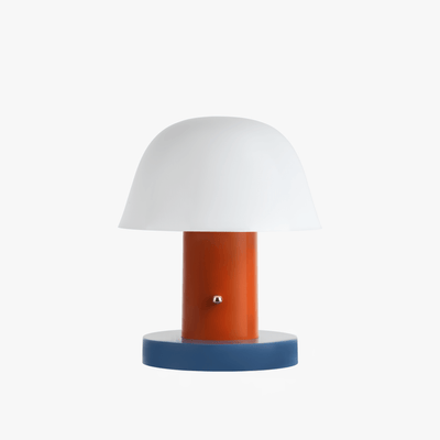 Linn cordless table lamp with compact silhouette, rechargeable battery base, and warm light tone