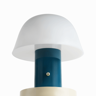 Linn cordless table lamp with compact silhouette, rechargeable battery base, and warm light tone