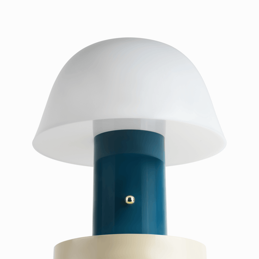 Linn cordless table lamp with compact silhouette, rechargeable battery base, and warm light tone