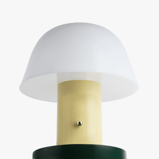 Linn cordless table lamp with compact silhouette, rechargeable battery base, and warm light tone
