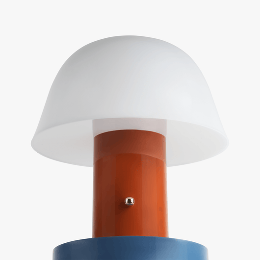 Linn cordless table lamp with compact silhouette, rechargeable battery base, and warm light tone