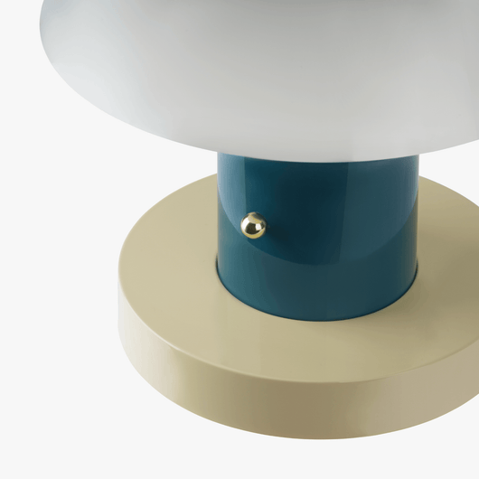 Linn cordless table lamp with compact silhouette, rechargeable battery base, and warm light tone