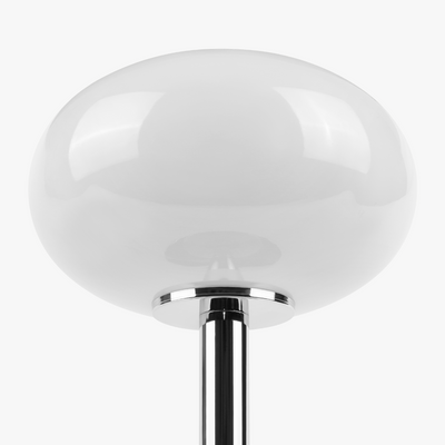 Selene glass table lamp with smooth glass globe shade on a weighted solid metal base