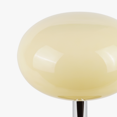 Selene glass table lamp with smooth glass globe shade on a weighted solid metal base