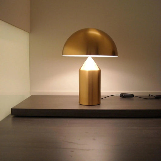 Marin geometric table lamp with clean modern silhouette on a solid metal body
