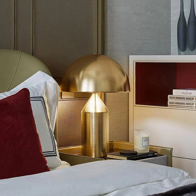 Marin geometric table lamp with clean modern silhouette on a solid metal body