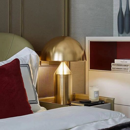 Marin geometric table lamp with clean modern silhouette on a solid metal body