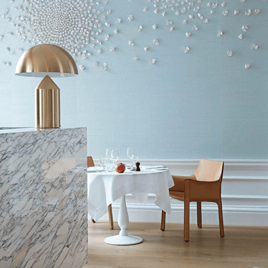 Marin geometric table lamp with clean modern silhouette on a solid metal body