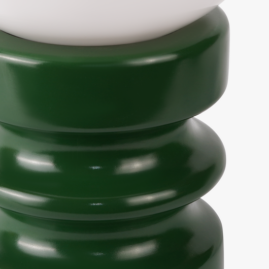 Luma glass table lamp with frosted glass globe shade on a weighted compact base