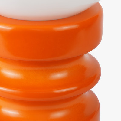 Luma glass table lamp with frosted glass globe shade on a weighted compact base