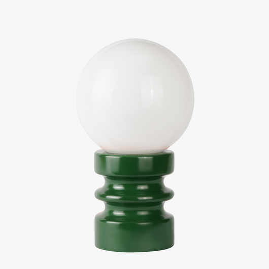 Luma glass table lamp with frosted glass globe shade on a weighted compact base
