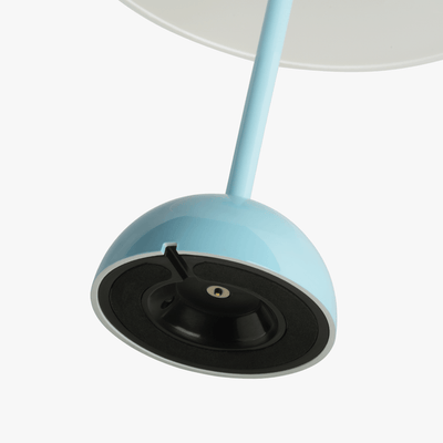 Mio cordless lamp with gentle bell silhouette, painted body, and rechargeable battery design