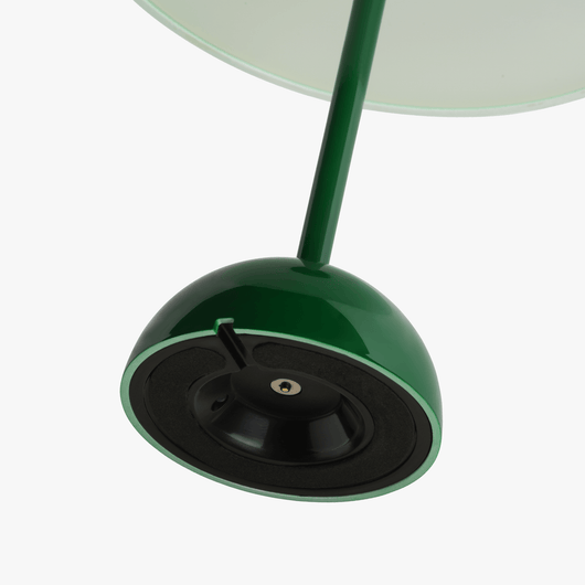 Mio cordless lamp with gentle bell silhouette, painted body, and rechargeable battery design