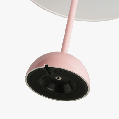 Mio cordless lamp with gentle bell silhouette, painted body, and rechargeable battery design