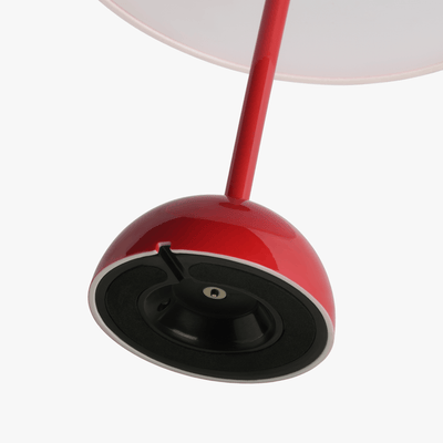 Mio cordless lamp with gentle bell silhouette, painted body, and rechargeable battery design