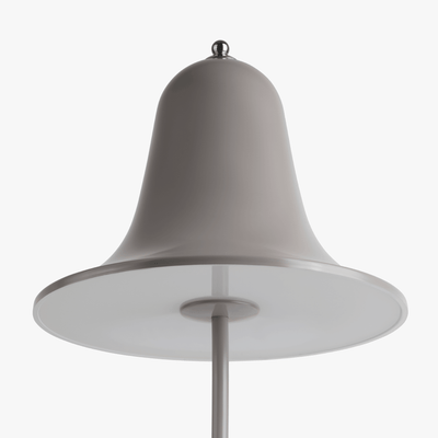 Mio cordless lamp with gentle bell silhouette, painted body, and rechargeable battery design