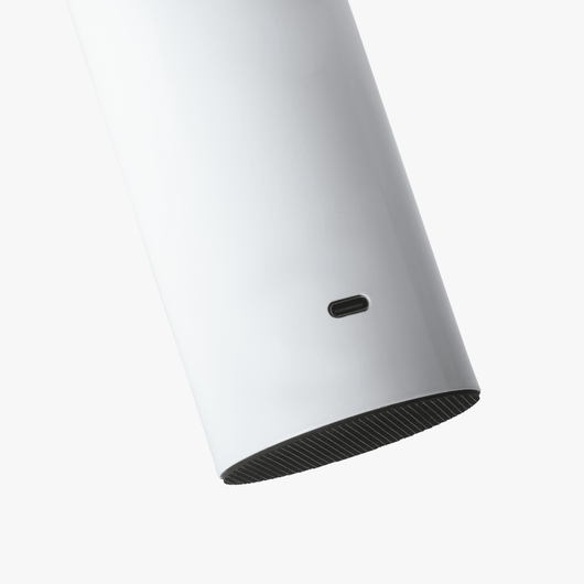 Cana cordless candle-shaped lamp with slim stem, softly rounded top, and rechargeable LED