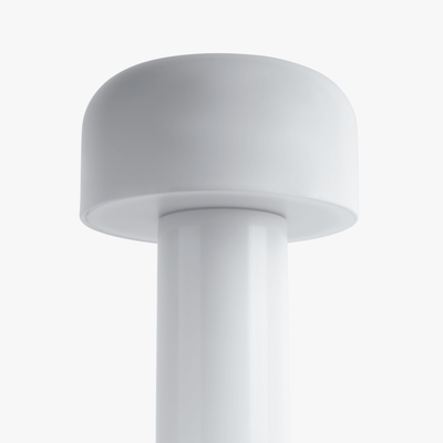 Cana cordless candle-shaped lamp with slim stem, softly rounded top, and rechargeable LED