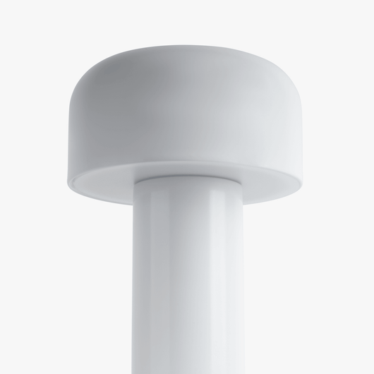 Cana cordless candle-shaped lamp with slim stem, softly rounded top, and rechargeable LED