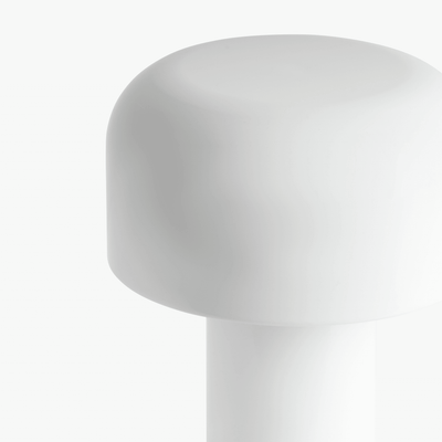 Cana cordless candle-shaped lamp with slim stem, softly rounded top, and rechargeable LED