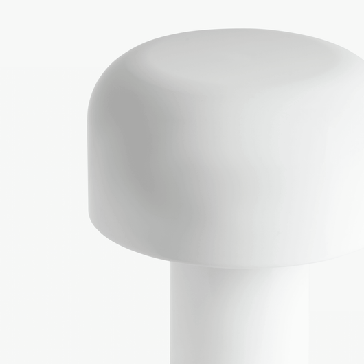 Cana cordless candle-shaped lamp with slim stem, softly rounded top, and rechargeable LED