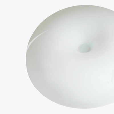 Noma Brilliant White mushroom lamp top angle showing the wide dome and low stem