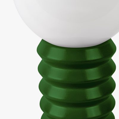 Maren glass globe table lamp with frosted shade on a sculpted wooden base