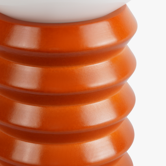 Maren glass globe table lamp with frosted shade on a sculpted wooden base