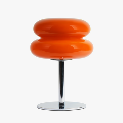 Verdon macaron table lamp in Neon Orange with three stacked stained glass discs on a chrome base