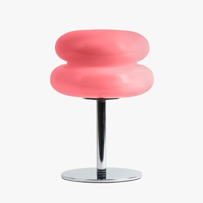 Verdon macaron table lamp in Bubblegum Pink with three stacked stained glass discs on a chrome base