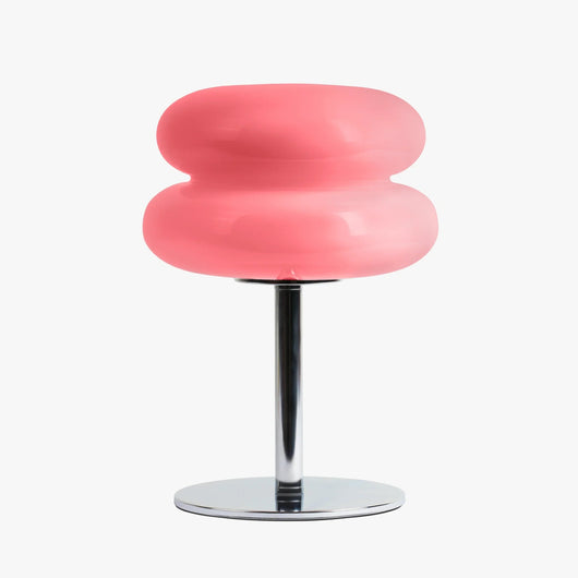 Verdon macaron table lamp in Bubblegum Pink with three stacked stained glass discs on a chrome base