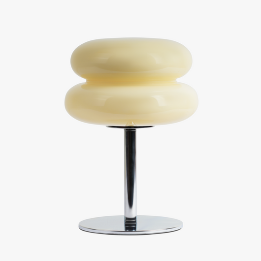 Verdon macaron table lamp in Buttercream Yellow with three stacked stained glass discs on a chrome base