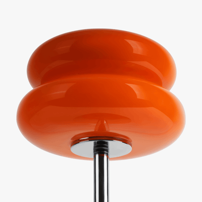 Verdon Neon Orange macaron lamp stained glass shade close-up showing the warm tinted glow