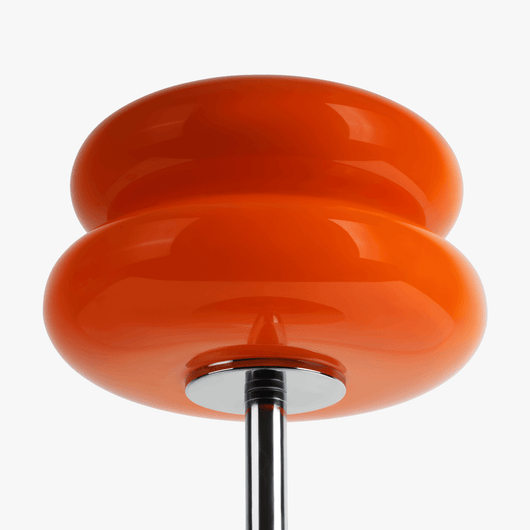 Verdon Neon Orange macaron lamp stained glass shade close-up showing the warm tinted glow
